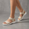 Beige FJØRNA women's orthopedic sandals with adjustable linen straps and cushioned soles, ideal for comfortable everyday wear.
