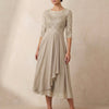 Beige embroidered FJØRNA A-line midi dress with sheer sleeves and side pockets, stylish and elegant for special occasions.