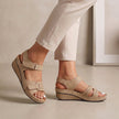 Beige FJØRNA orthopedic open toe wedge heel sandals with cushioned comfort fit, ideal for casual or summer wear.