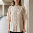 Beige summer blouse for women by FJØRNA with denim pockets, casual top perfect for warm weather and relaxed styles.