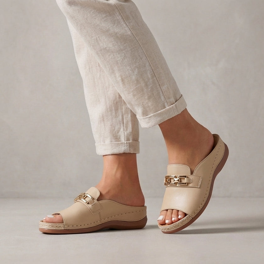 Beige FJØRNA orthopedic peep-toe chain link wedge sandals for women, featuring a stylish open-toe design and ankle strap.