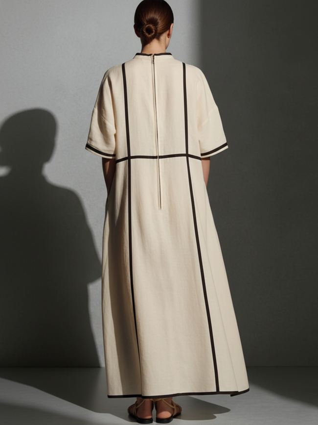 Beige linen maxi dress for women by FJØRNA, flowing fabric, sleeveless design, and relaxed fit perfect for warm weather.