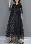 FJØRNA black tulle party dress with O-neck, asymmetrical hem, and half sleeves, perfect for elegant evening occasions