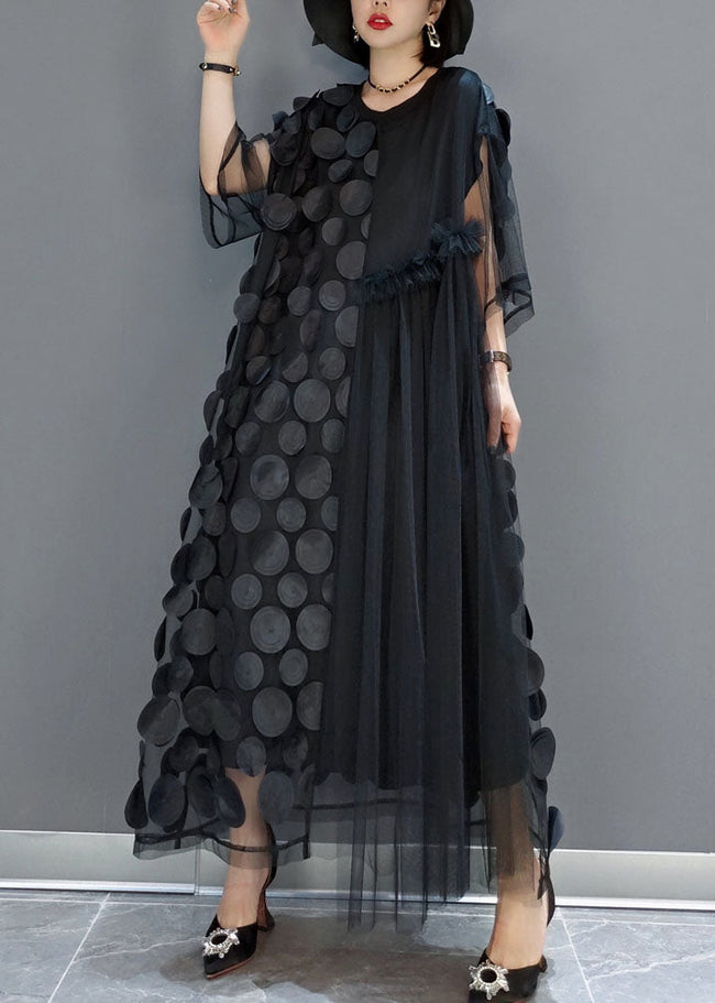 FJØRNA black tulle party dress with O-neck, asymmetrical hem, and half sleeves, perfect for elegant evening occasions