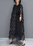 FJØRNA black tulle party dress with o-neck, asymmetrical hem, and half sleeves, perfect for evening occasions.
