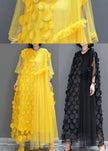 FJØRNA black tulle party dress with o-neck, asymmetrical hem, and half sleeves, ideal for evening events and celebrations.