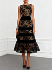 Black mesh floral sleeveless A-line midi dress by FJØRNA with boat neckline and lace details, perfect for elegant occasions.