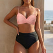 FJØRNA black fitted wrap bikini set for women, showcasing the stylish and supportive bikini top and bottom on a model.