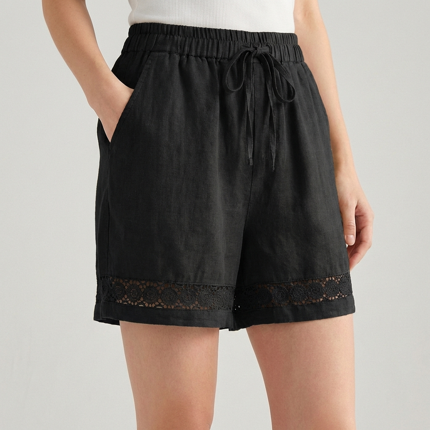 Black FJØRNA mini dress for women with drawstring linen fabric, featuring a stylish, elegant design perfect for casual or dressy occasions.