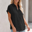 Black women's collared button-up blouse with cuffed sleeves and chest pocket by FJØRNA, stylish and versatile top for any occasion.