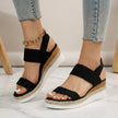 Black FJØRNA women's orthopedic espadrilles with adjustable strap and arch support, designed for comfortable walking.
