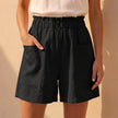 Black women's summer linen shorts with pockets by FJØRNA, featuring a relaxed fit and casual style.