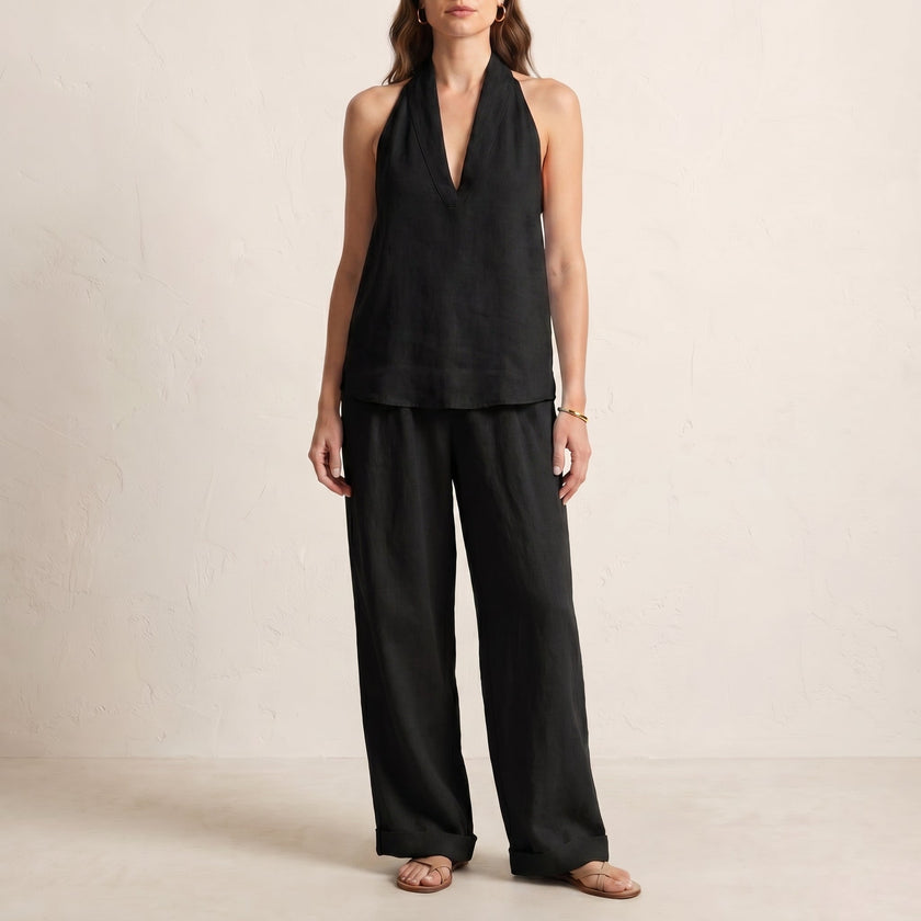 Black FJØRNA relaxed two-piece halter V-neck set with wide-leg pants, featuring a stylish and comfortable coordinated outfit.