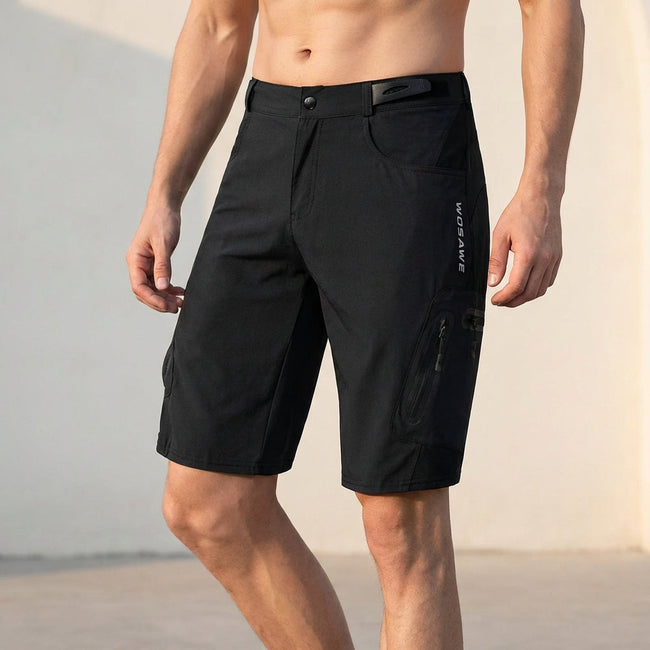 Men's black outdoor performance shorts by FJØRNA with zippered pockets, designed for comfort and active wear.