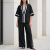 FJØRNA Coastal Chic black 2-piece set with contrast trim top and wide-leg pants, stylish and comfortable for casual wear