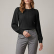 Black FJØRNA women's summer blouse with long sleeves and pleated denim fabric, stylish and lightweight for warm weather.