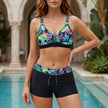 Black women's summer bikini with tropical drawstring design, stylish swimwear by FJØRNA perfect for beach or poolside.