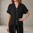 FJØRNA women's black summer blouse with V-neck and ruffle details, casual denim top for women, stylish and comfortable.