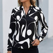 FJØRNA relaxed print women's blouse with abstract pattern, black color, shirt collar, casual top suitable for everyday wear