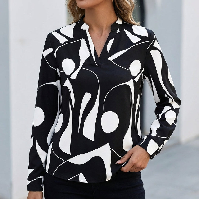 FJØRNA relaxed print women's blouse with abstract pattern, black color, shirt collar, casual top suitable for everyday wear