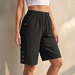 Black women's summer shorts by FJØRNA featuring high waist, linen fabric, pockets, and lightweight design.