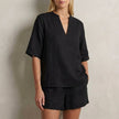 Black summer two-piece women's co-ord set with pockets and V-neck, stylish and comfortable from FJØRNA.
