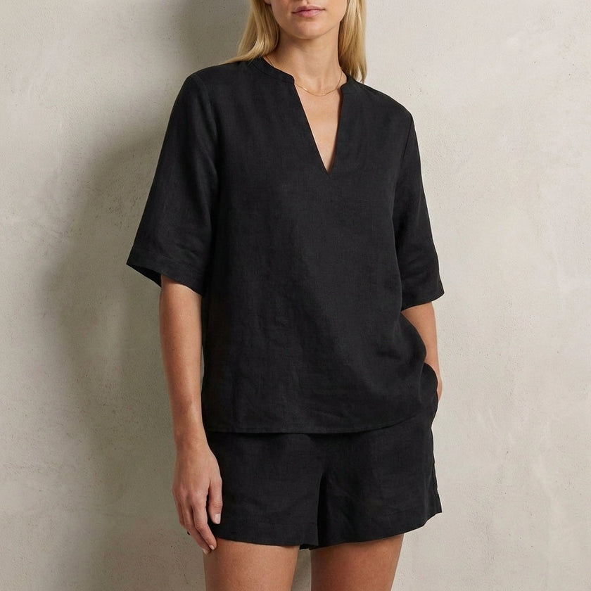 Black summer two-piece women's co-ord set with pockets and V-neck, stylish and comfortable from FJØRNA.