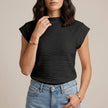 Black high neck cap sleeve summer top for women by FJØRNA, showcasing a sleek, fitted design with a smooth fabric finish.