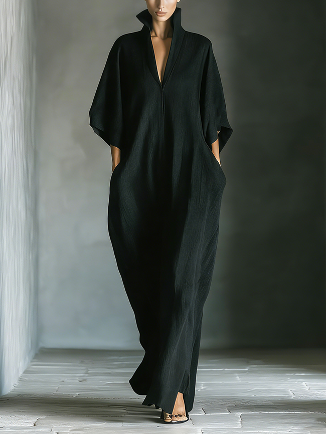 Black cotton maxi dress for women by FJØRNA, flowing long dress with a relaxed fit and sleeveless design.