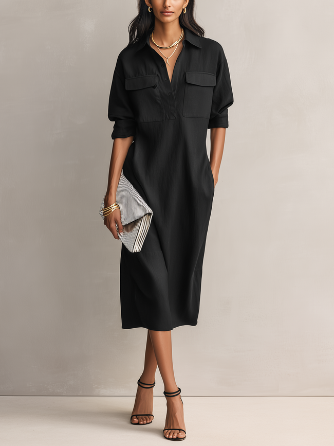 FJØRNA black linen midi dress for evening wear, featuring a fitted silhouette and elegant design perfect for formal occasions.
