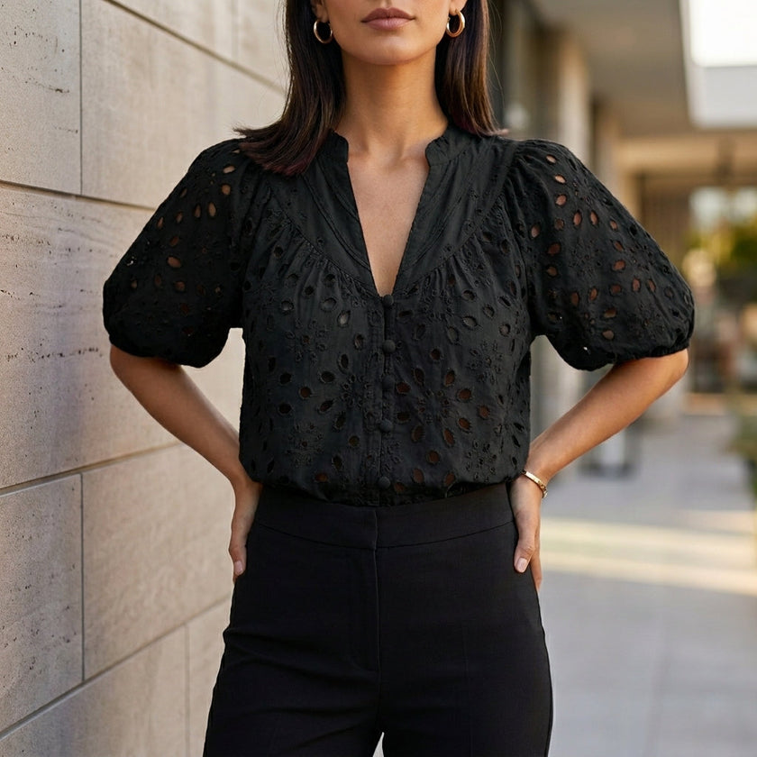 Black FJØRNA women's summer blouse with V-neck, linen fabric, button front, casual style, perfect for warm weather.