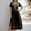 Black FJØRNA bohemian A-line scoop neck maxi dress for women, flowing fabric and relaxed fit, perfect for casual or summer wear.