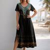 Black FJØRNA bohemian A-line scoop neck maxi dress for women, flowing fabric and relaxed fit, perfect for casual or summer wear.