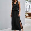 Black FJØRNA relaxed fit sleeveless V-neck maxi dress for women, flowing fabric and elegant design perfect for casual or dressy occasions.