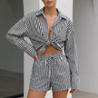 Black FJØRNA women's summer two-piece striped co-ord set with drawstring waist and short sleeves.