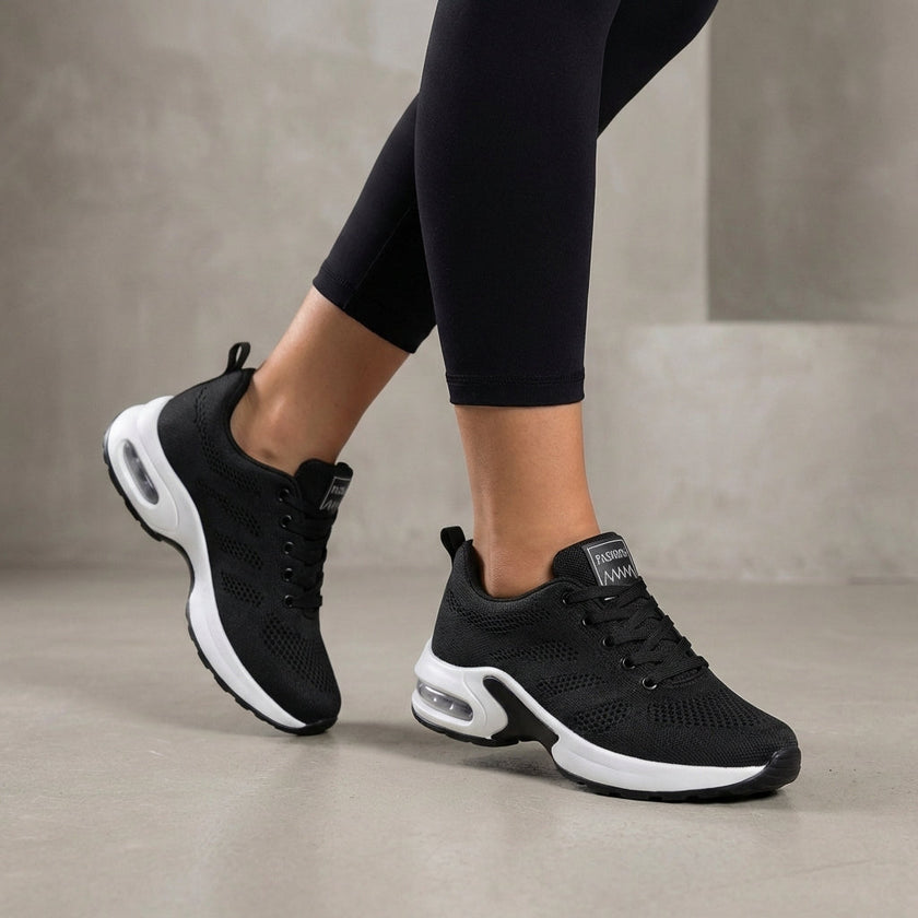 Black FJØRNA women's orthopedic sneakers with knit upper and arch support, designed for summer comfort and stylish casual wear.