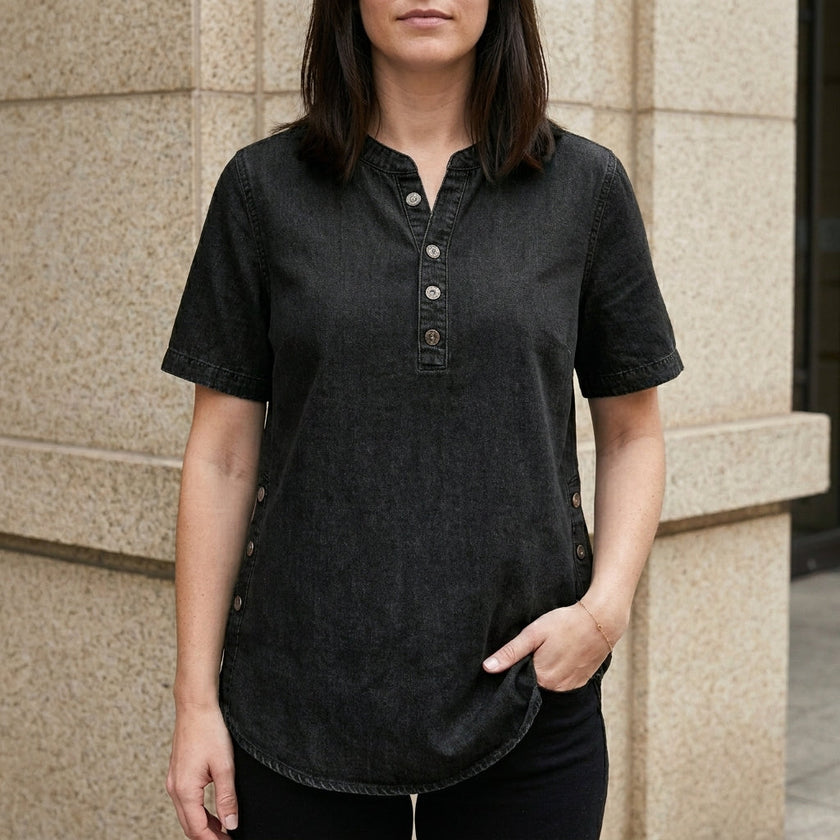 Black denim women's summer top by FJØRNA featuring a button-front design and sleeveless style.