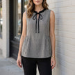 Black Gingham sleeveless summer blouse for women by FJØRNA, featuring a stylish and breathable top in a classic pattern.