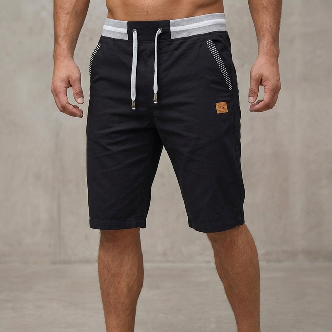 Men's black tailored relaxed-fit work shorts by FJØRNA, casual and comfortable pants for men, with a neat, modern look.