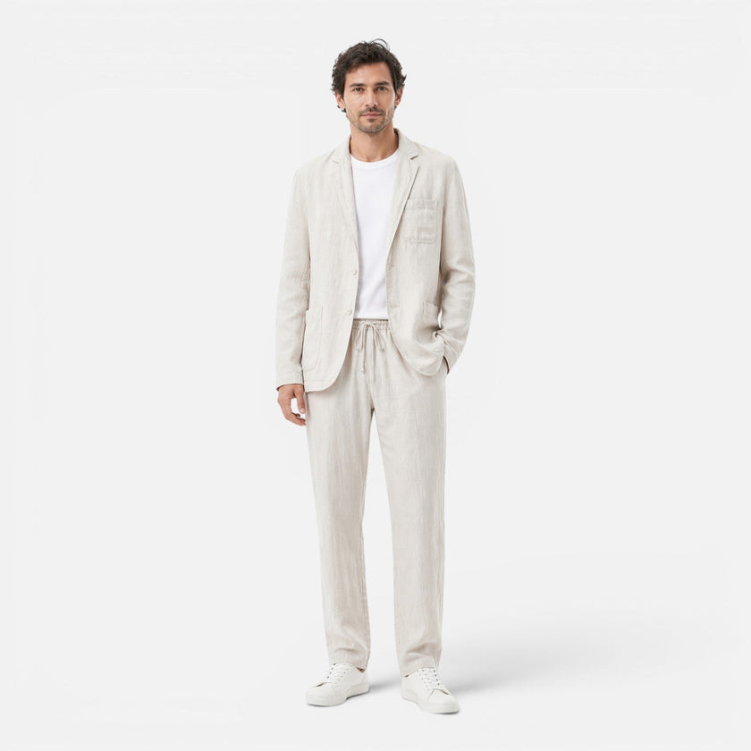 FJØRNA men's linen suit set featuring a lightweight blazer and trousers, breathable summer classic fit for warm weather.