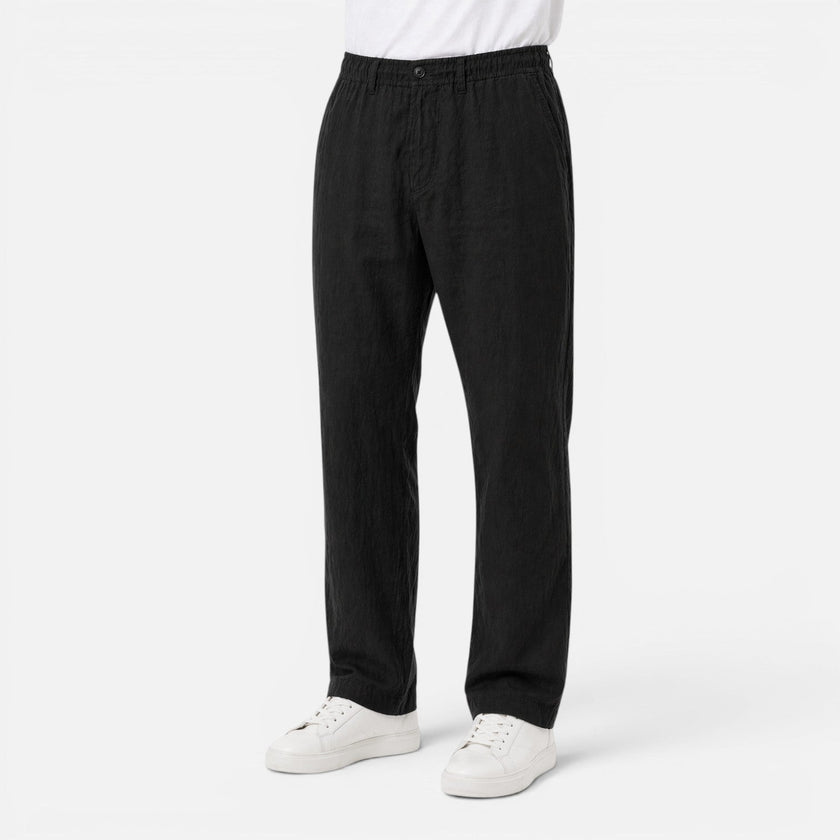 Men's lightweight linen suit set by FJØRNA, featuring a blazer and trousers in breathable summer fabric.