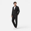 Men's lightweight linen suit set by FJØRNA, featuring a classic blazer and trousers for a breathable summer look.