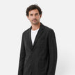 Men's linen suit set by FJØRNA featuring a lightweight, breathable blazer and trousers for a classic summer look.
