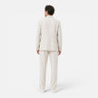 Men's lightweight linen suit set by FJØRNA featuring a classic fit blazer and trousers for breathable summer style.