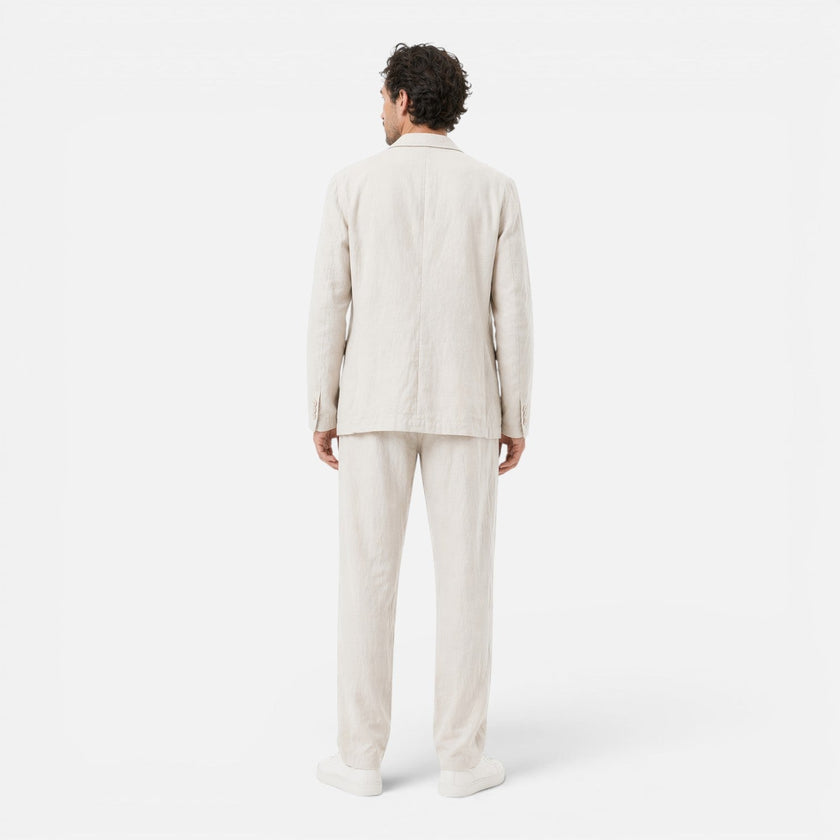 Men's lightweight linen suit set by FJØRNA featuring a classic fit blazer and trousers for breathable summer style.