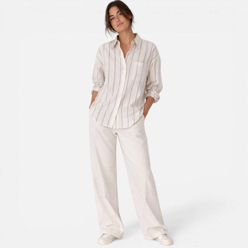 Women's FJØRNA striped button-down shirt with relaxed fit, lightweight and casual for everyday wear.