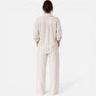 Women's striped button-down relaxed fit lightweight shirt by FJØRNA, featuring a casual, stylish blouse with vertical stripe pattern.