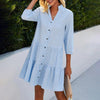 Blue gingham summer dress for women with a V-neck, stylish and lightweight, by FJØRNA, perfect for warm weather.