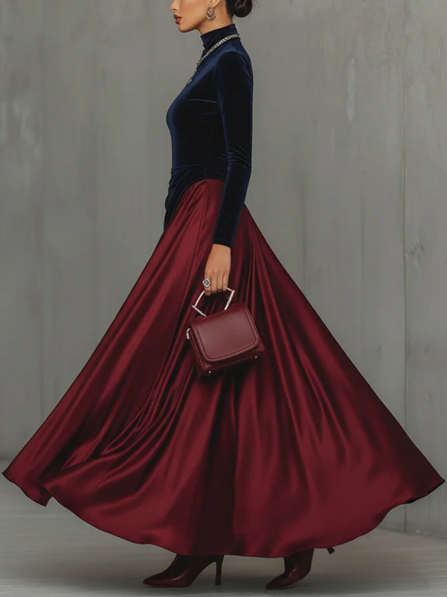 FJØRNA women's long maxi dress featuring blue velvet and burgundy satin color block design, elegant and stylish for special occasions.
