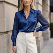 Blue striped summer blouse for women with high waist, stylish top by FJØRNA, perfect for warm weather and casual wear.